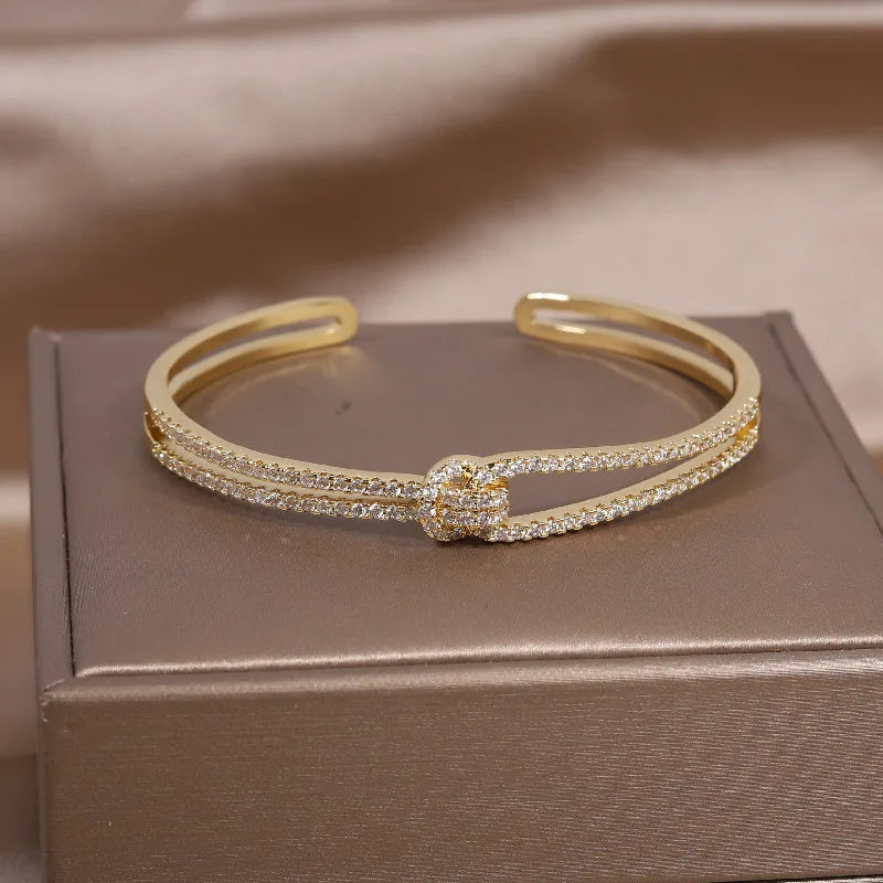 Plated zircon letter X opening bracelet
