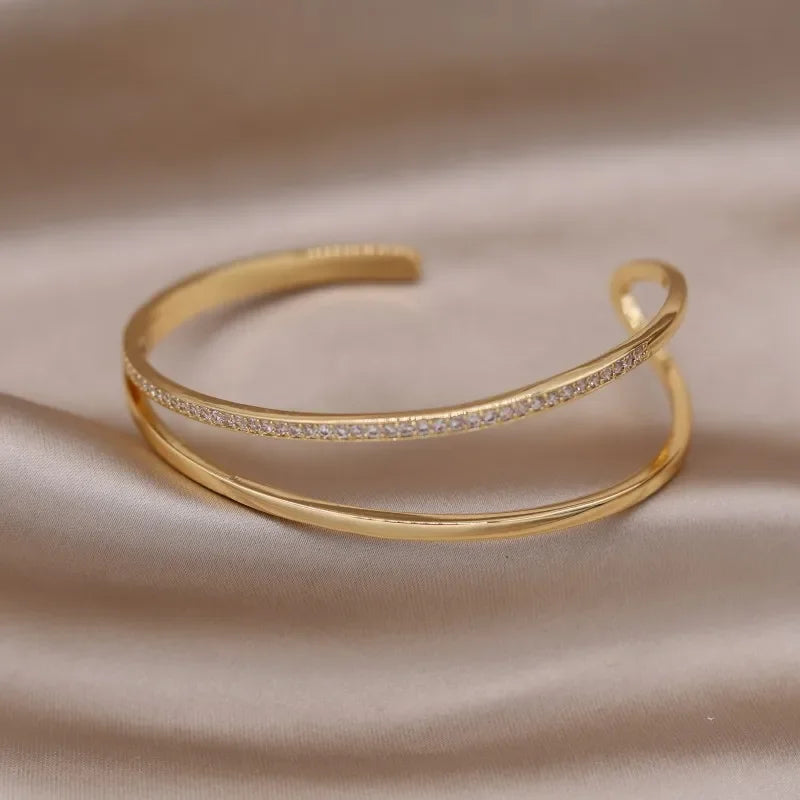 Plated zircon letter X opening bracelet