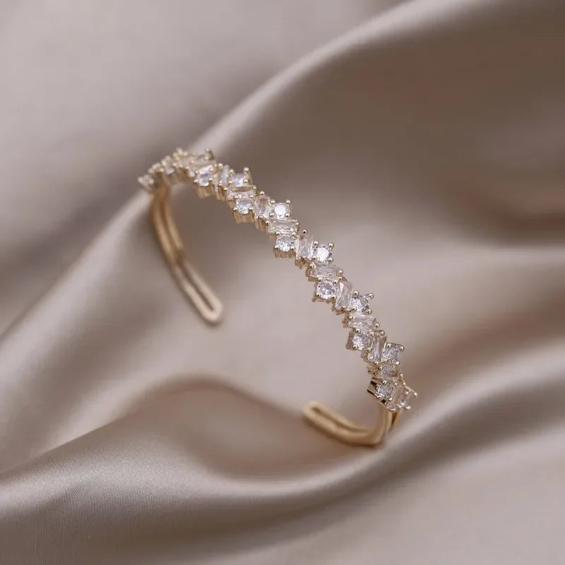 Plated zircon letter X opening bracelet