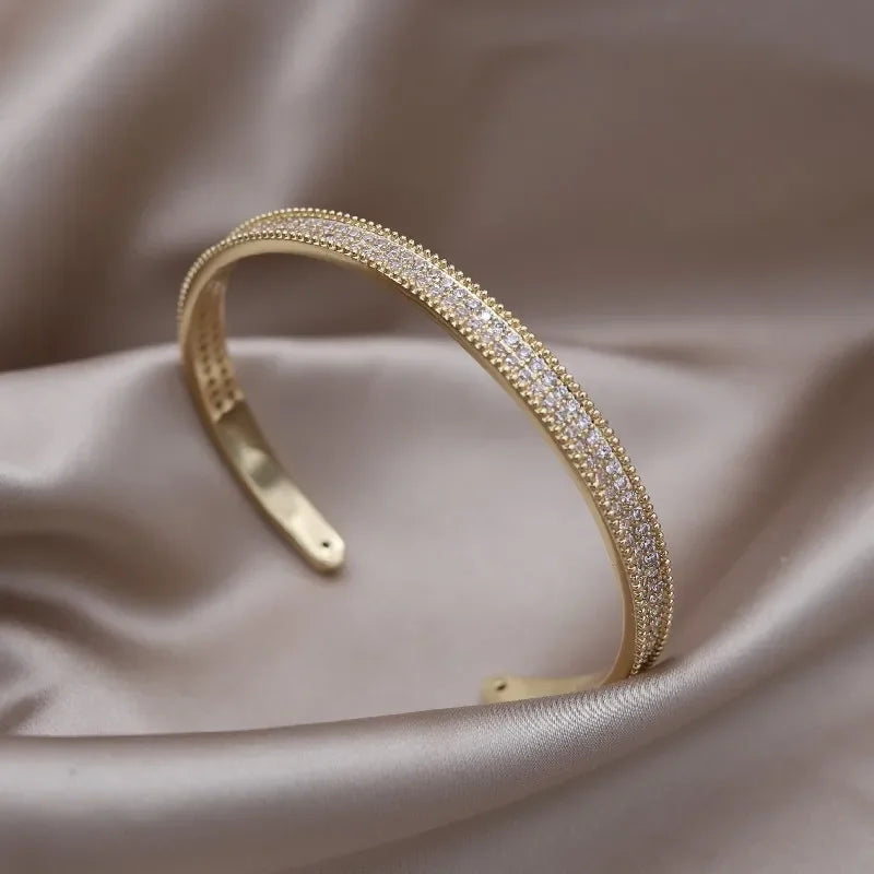 Plated zircon letter X opening bracelet