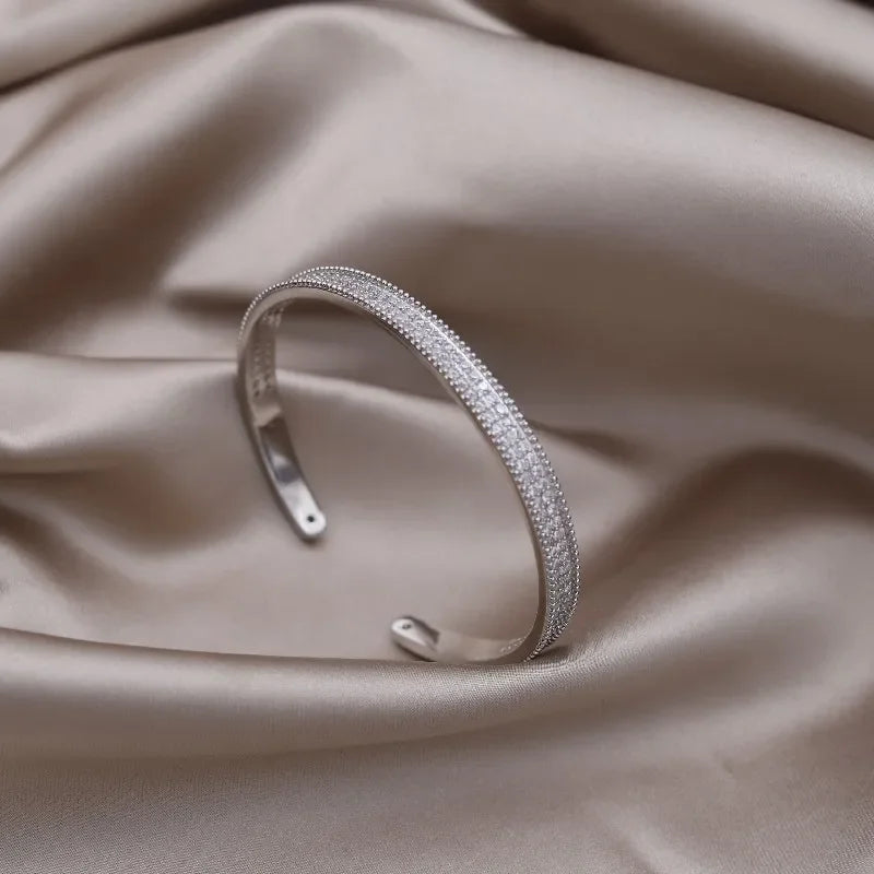 Plated zircon letter X opening bracelet