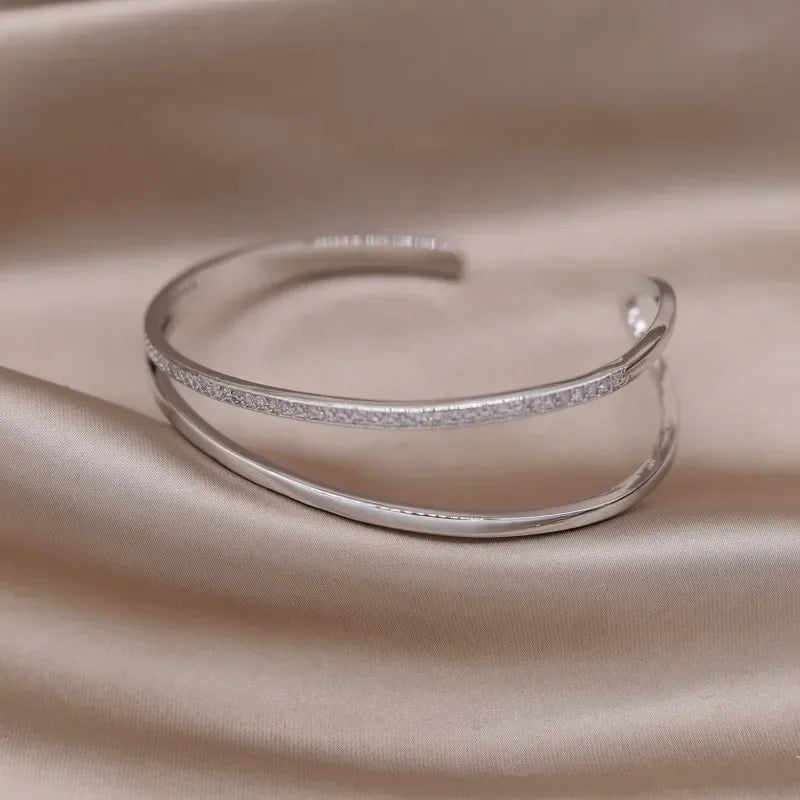 Plated zircon letter X opening bracelet