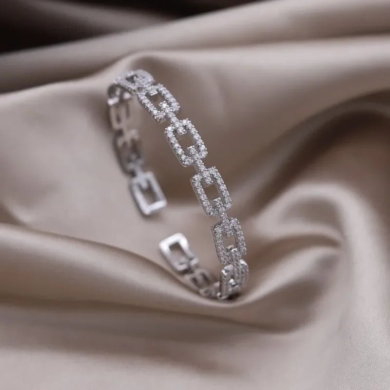 Plated zircon letter X opening bracelet